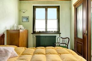 Posteľ alebo postele v izbe v ubytovaní Casa Vacanze il Ginepro