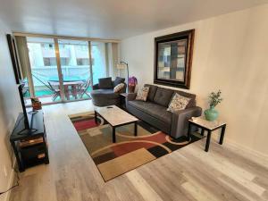 a living room with a couch and a table at Lux Resort Condo (Old Town Scottsdale!) in Scottsdale