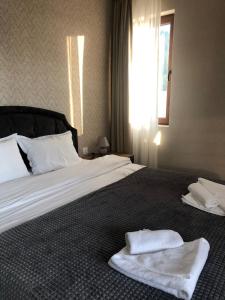 Ένα ή περισσότερα κρεβάτια σε δωμάτιο στο Luxury Apartments Studenets +28 φωτογραφίες