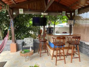 TV a/nebo společenská místnost v ubytování LOFTSCACAO APARTMENTS, Villas Cacao, near to Playa Bonita Limón