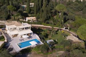 an aerial view of a house with a swimming pool at VILLA SORELLINA in Gouvia