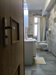 Ett badrum på Apartament Marysia Sławno