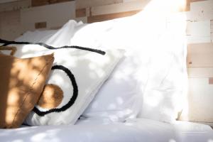 Łóżko lub łóżka w pokoju w obiekcie Villa B
