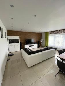 Ένα ή περισσότερα κρεβάτια σε δωμάτιο στο Ferienhaus Olaf & Olga Buchali GbR