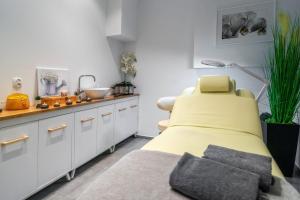 Kuchyňa alebo kuchynka v ubytovaní Apartamenty Sun & Snow Resorts F Białka Tatrzańska z sauną