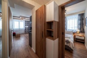 Posteľ alebo postele v izbe v ubytovaní Apartamenty Sun & Snow Resorts F Białka Tatrzańska z sauną