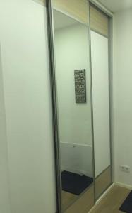 a mirror in a bathroom with a sign in it at NEW Apartment - 10 min DOWNTOWN in Vienna