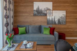 Posedenie v ubytovaní Apartamenty Sun & Snow Resorts F Białka Tatrzańska z sauną