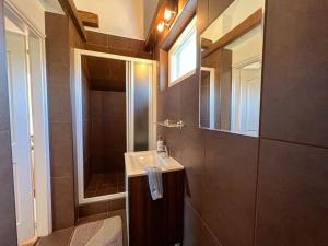 Kúpeľňa v ubytovaní SunnySide Apartmanház