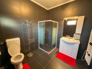 Kúpeľňa v ubytovaní SunnySide Apartmanház