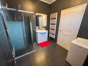 Kúpeľňa v ubytovaní SunnySide Apartmanház