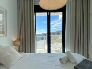 Posteľ alebo postele v izbe v ubytovaní Balcon del Mar Seaview 211 Casasol