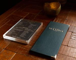 two books sitting on top of a table at The White Lion Hotel in Aldeburgh