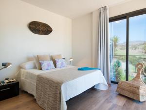 Postel nebo postele na pokoji v ubytování Los Lagos 20 by VillaGranCanaria