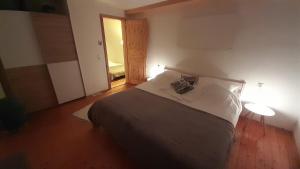 Postel nebo postele na pokoji v ubytování Ferienhaus "Schleif" + 9 fotografií