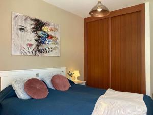 Posteľ alebo postele v izbe v ubytovaní Precioso apto 4 pers, 2 piscinas, fibra óptica + 17 fotografií