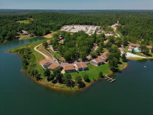 an island in the middle of a body of water at Crown Lake Resort & RV in Horseshoe Bend