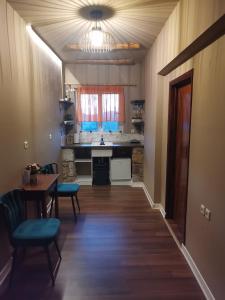 Kuchyň nebo kuchyňský kout v ubytování Ataviros Hotel