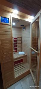 a sauna with wooden walls at Castello Room & Spa in Cagliari +24 photos