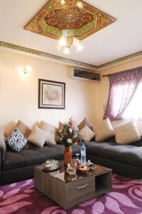 Posezení v ubytování Aparthotel Les Oliviers Suites & Spa