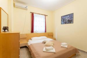 A bed or beds in a room at House with majestic sea view