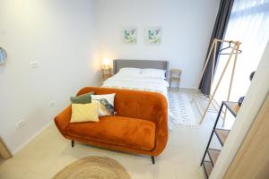 Posteľ alebo postele v izbe v ubytovaní Apartmani Kolovare