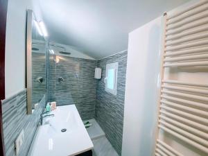 Koupelna v ubytování CASA ISMA + 4 fotografie