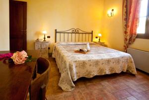 Postel nebo postele na pokoji v ubytování Agriturismo Borgo Vigna Vecchia