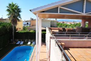 a view of a house with a swimming pool at VILLA ALFABIA in Palma de Mallorca