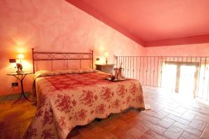 Postel nebo postele na pokoji v ubytování Agriturismo Borgo Vigna Vecchia