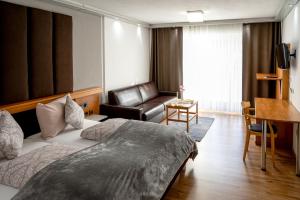 Postel nebo postele na pokoji v ubytování Haiminger Hof + 37 fotografií