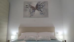 Postel nebo postele na pokoji v ubytování Urban Apartment Vukić