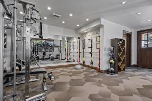 a fitness room with a gym with tread machines at Silver Strike Lodge #407 - 4 Bed in Park City