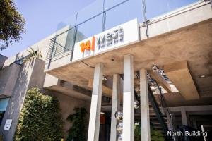 a building with a nunit sign on the side of it at 14 West Laguna Beach in Laguna Beach