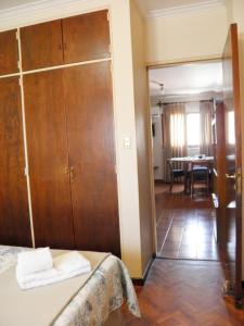 Ein Bett oder Betten in einem Zimmer der Unterkunft BuenosAires212