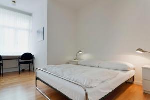 Ein Bett oder Betten in einem Zimmer der Unterkunft Hotel Monte Verità
