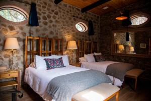 Postel nebo postele na pokoji v ubytování Nirvana Restaurant & Retreat + 37 fotografií