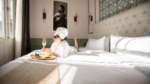 Letto o letti in una camera di Illa Experience Hotel