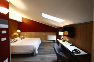 Postel nebo postele na pokoji v ubytování Hotel Italia