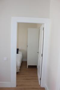 Postel nebo postele na pokoji v ubytování La Casona de Galdós