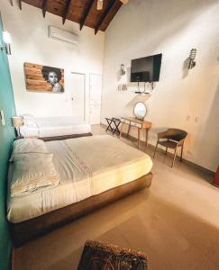 Cama ou camas em um quarto em Casa Las Palmas Hotel Boutique