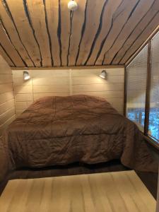 Cama o camas de una habitación en Loma-asunto Kaarna, Kalajärvi
