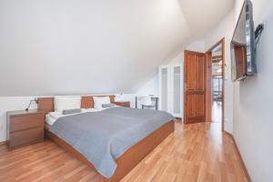 Posteľ alebo postele v izbe v ubytovaní Panorama Buda + 37 fotografií