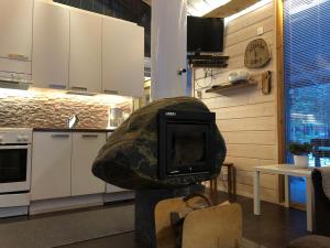 Kuchyň nebo kuchyňský kout v ubytování Loma-asunto Kaarna, Kalajärvi