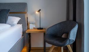 Postel nebo postele na pokoji v ubytování Hotel Residenz Hochalm - Joker Card Partner