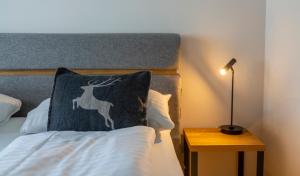 Ein Bett oder Betten in einem Zimmer der Unterkunft Hotel Residenz Hochalm
