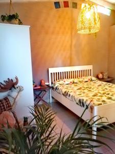 Łóżko lub łóżka w pokoju w obiekcie Vivienda Vacacional Vaiana