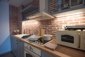 Kuchyňa alebo kuchynka v ubytovaní Ammos Lux Apartments Crete