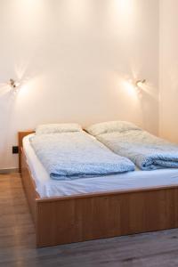 Postel nebo postele na pokoji v ubytování Arboro Cinereo - central, premium and cozy