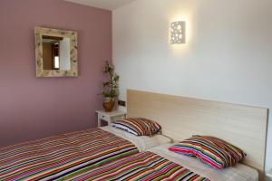 A bed or beds in a room at Casa Rural Aranaratxe